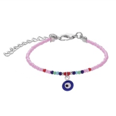 Mixed color rice beads and blue eyes alloy bracelet (eyes: 0.7cm, circumference: 16+6cm/material: alloy + rice beads + resin) Pink